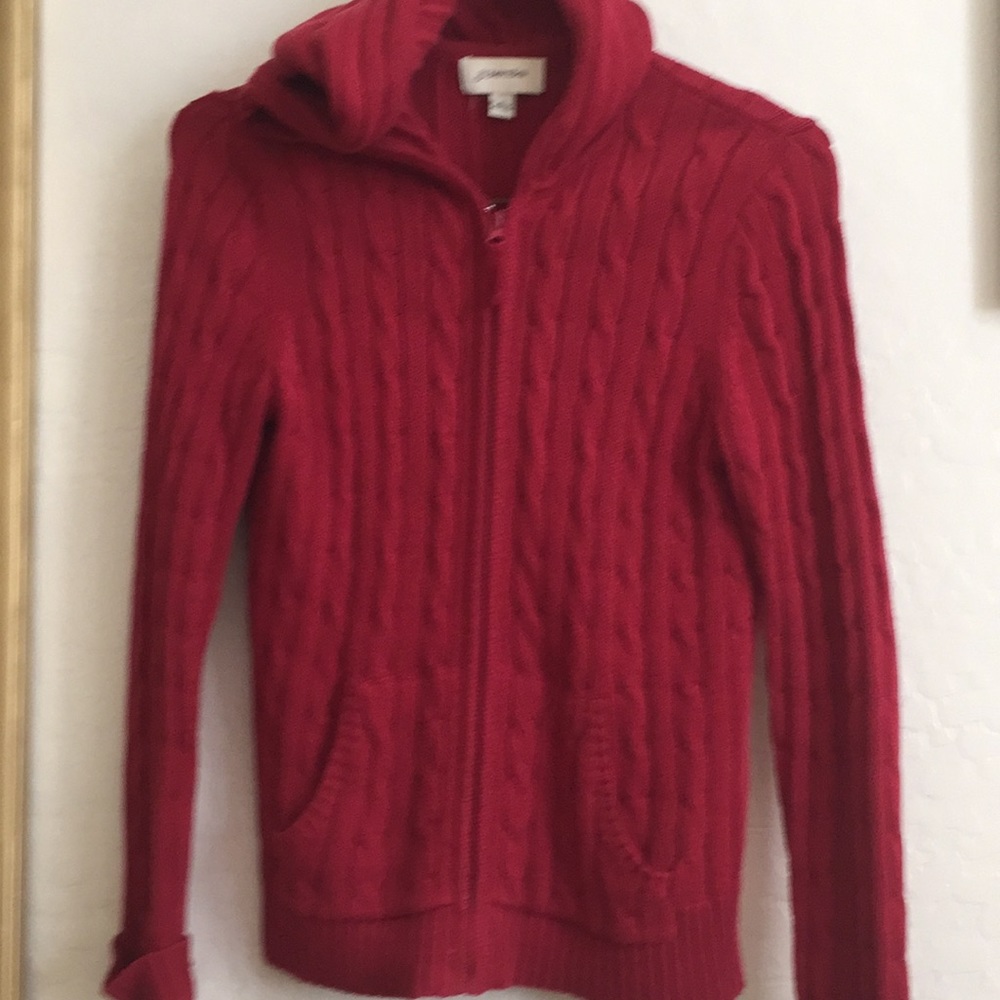 Red, zip up, cable knit hoodie.